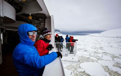 Passengers use hydraulic viewing platforms onboard Greg Mortimer, Antarctica; Scott Portelli